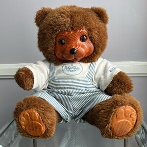 Vintage numbered Robert Raikes Brian bear with carved wooden face and feet
